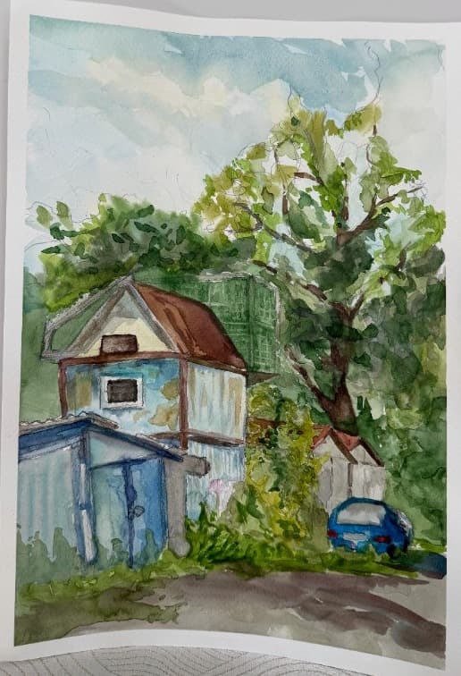 Blue House Among the Greens