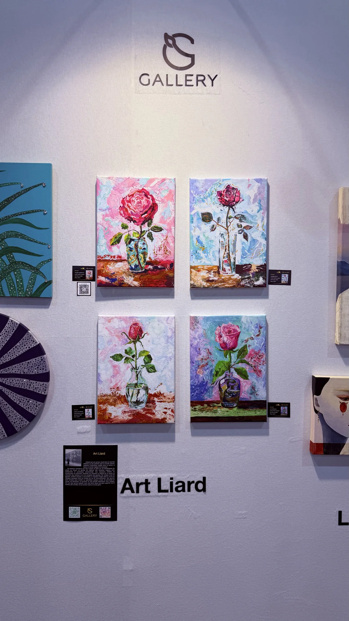 Four Art Liard rose still lifes on a white wall at the G Gallery stand, art3f Paris 2026, labelled Art Liard beneath the G GALLERRY mark